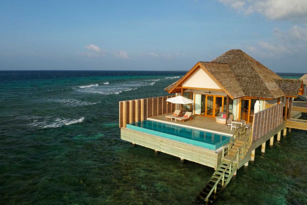 Superior Water villa exterior with private pool, sun deck and panoramic sea vie