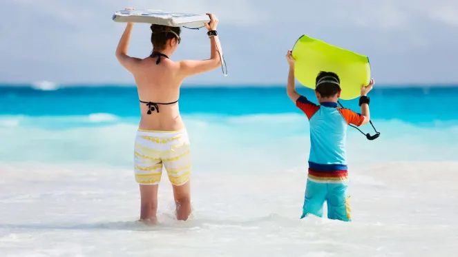 Surfing With Kids At Gili Lankanfushi Maldives