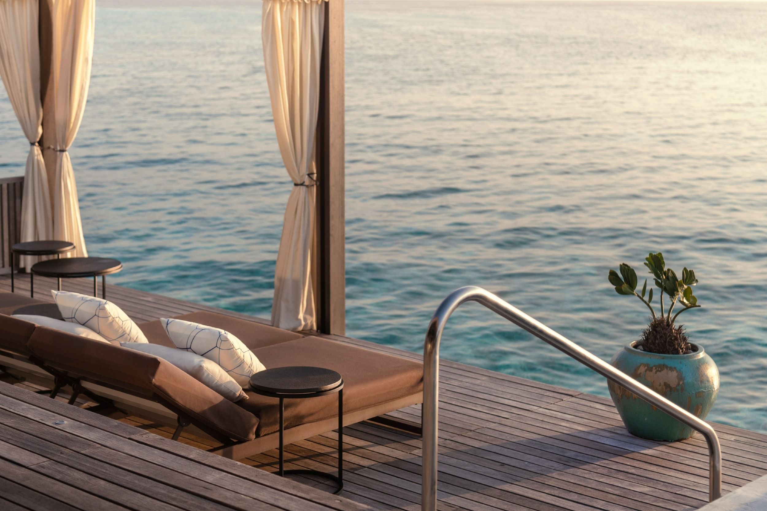 Sunset Deluxe Water Pool Villa deck lounge