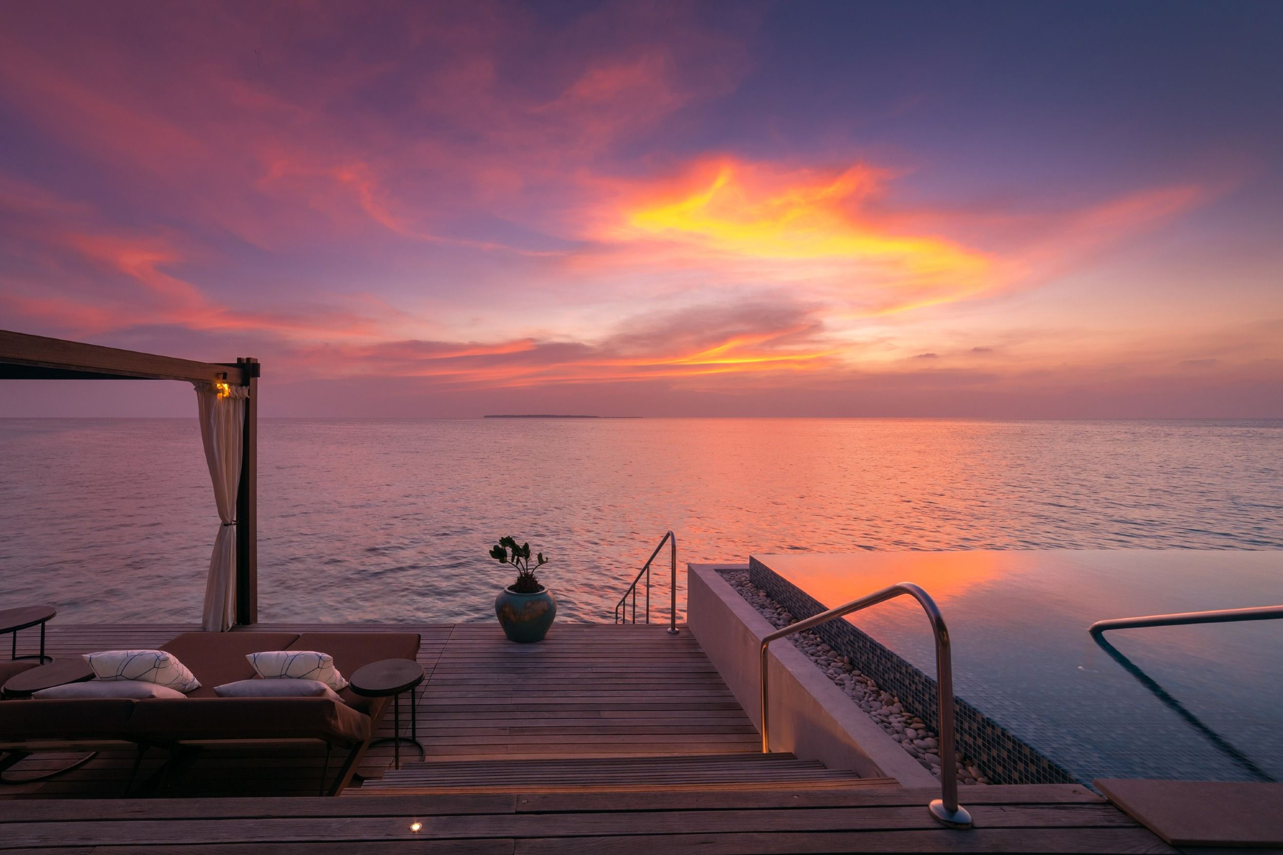 Sunset Deluxe Water Pool Villa deck sunset