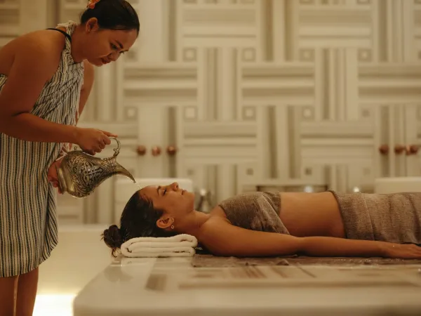 Turkish hammam treatment with warm water pour at JOALI Maldives spa.