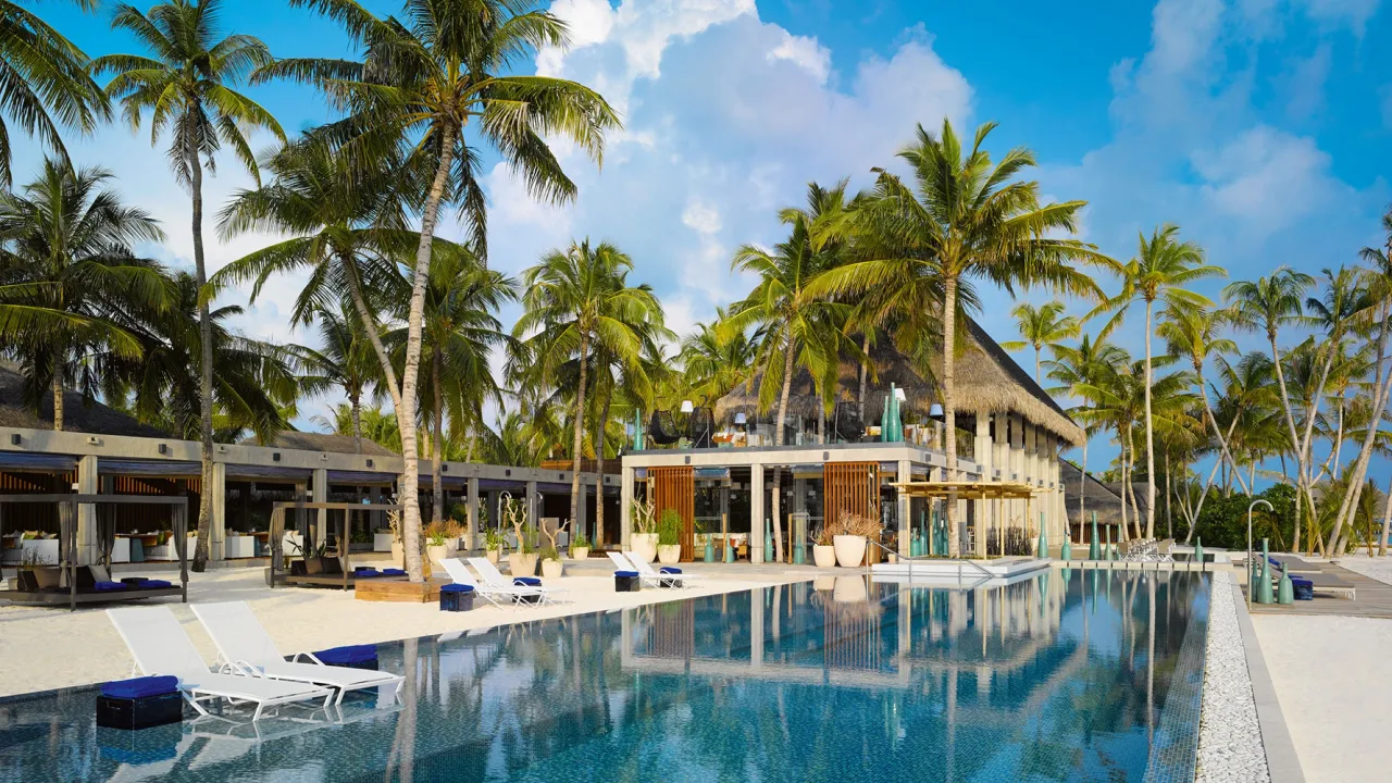 Athiri Restaurant at Velaa Private Island Maldives – beachfront dining with ocean views and fine cuisine in a luxury setting.