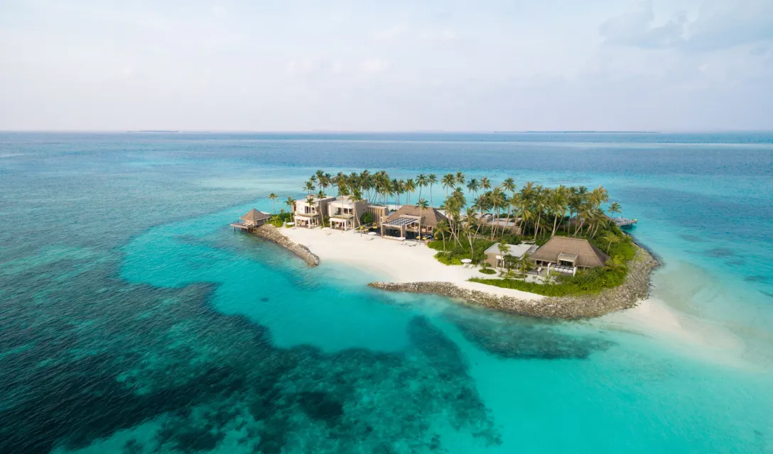 Aerial view of the Owner’s Villa at Cheval Blanc Randheli – private island retreat surrounded by turquoise Maldives waters.
