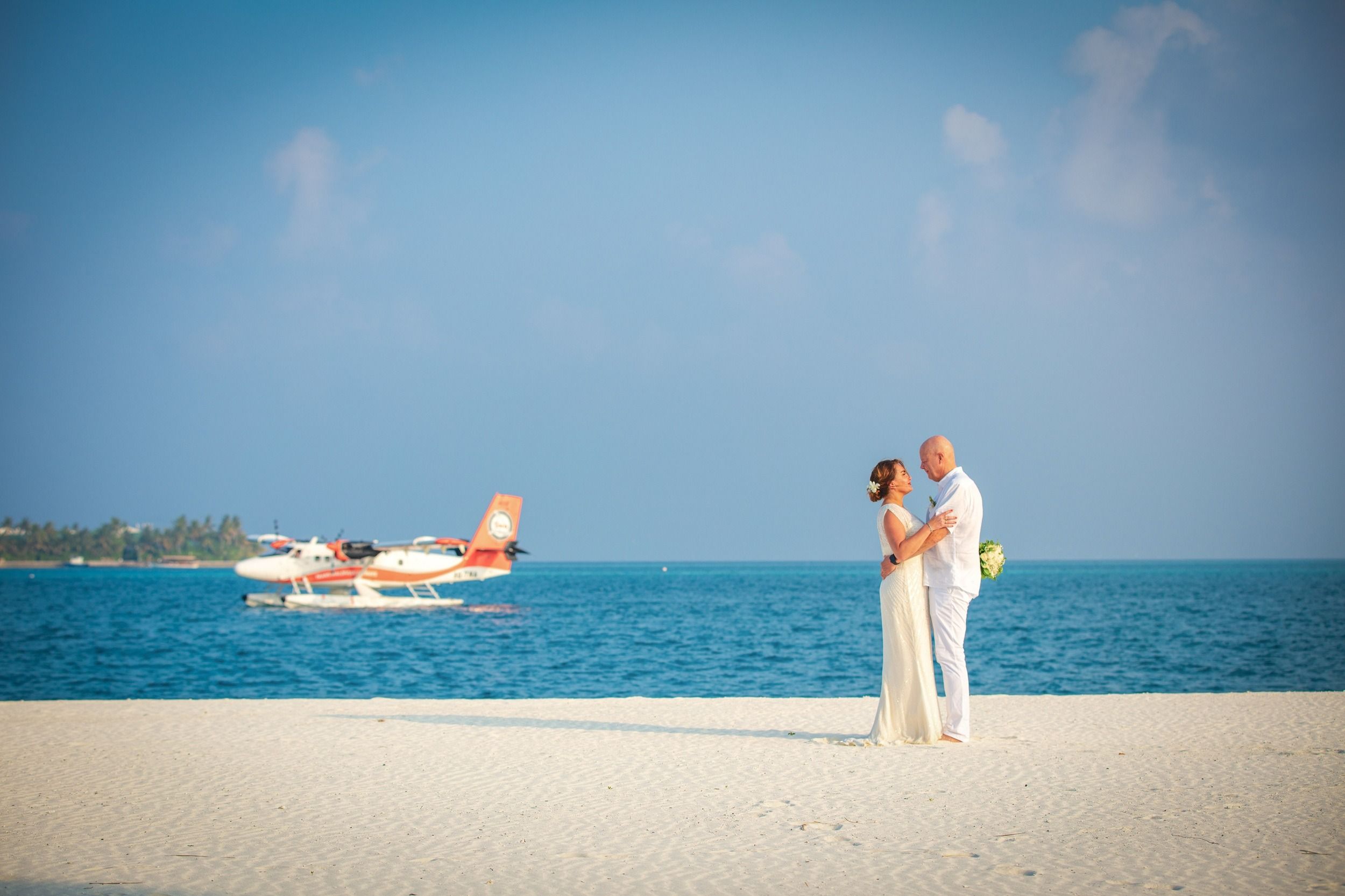Couple standing together on the beach