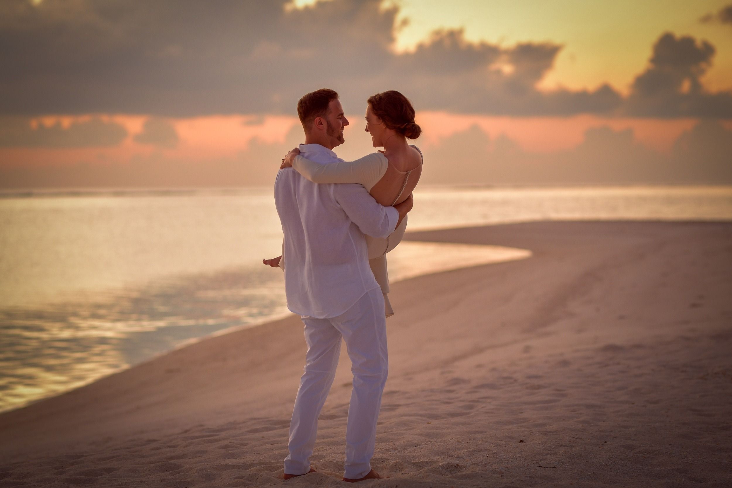 Smiling couple spending quality time on the beach