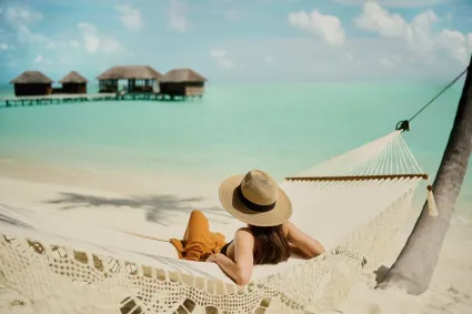 Conrad Maldives Rangali Island sunrise water villa over lagoon