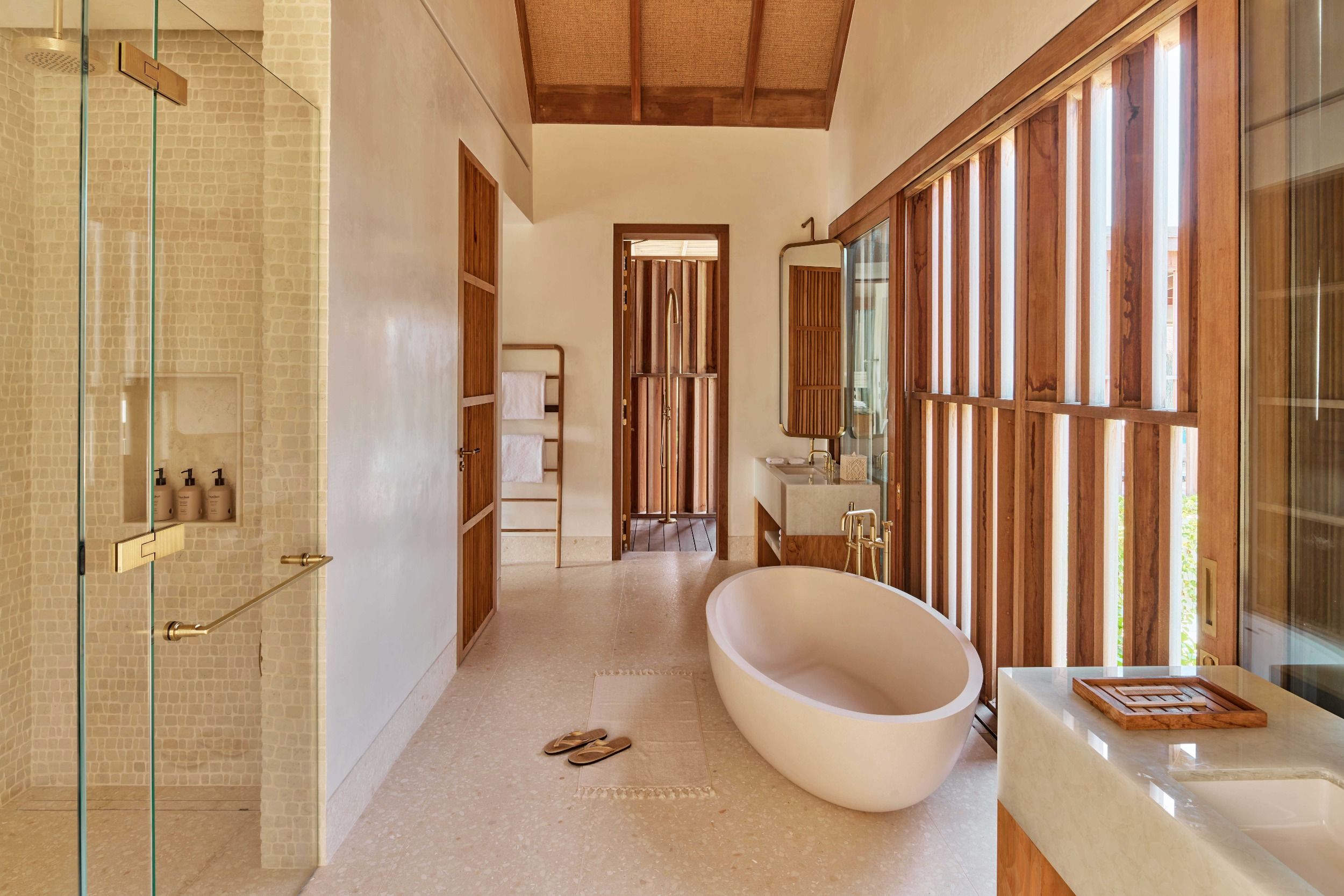 Ocean-side bathroom in three-bedroom residence