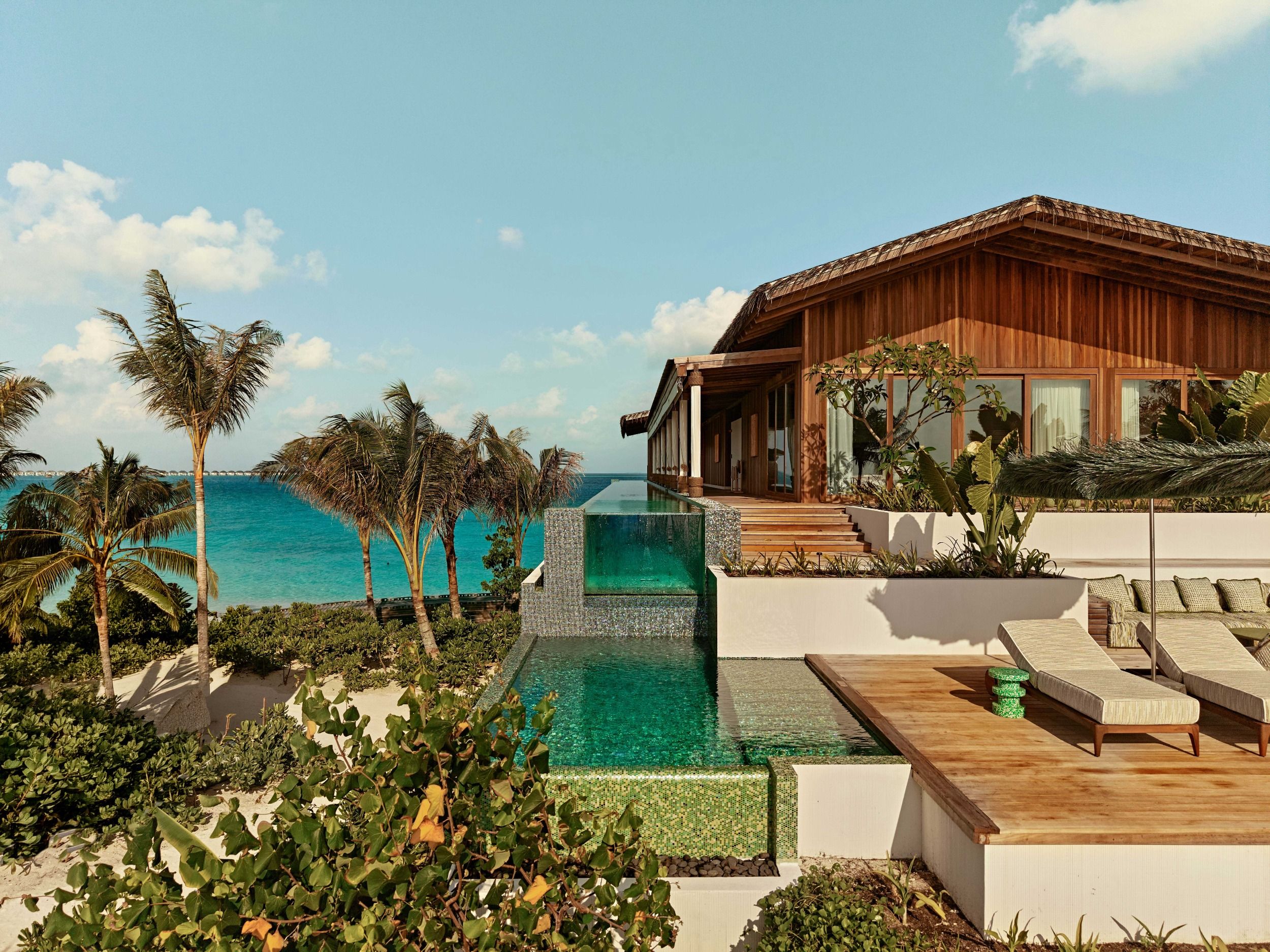 Aerial view of four-bedroom ocean-side residence with sky pool