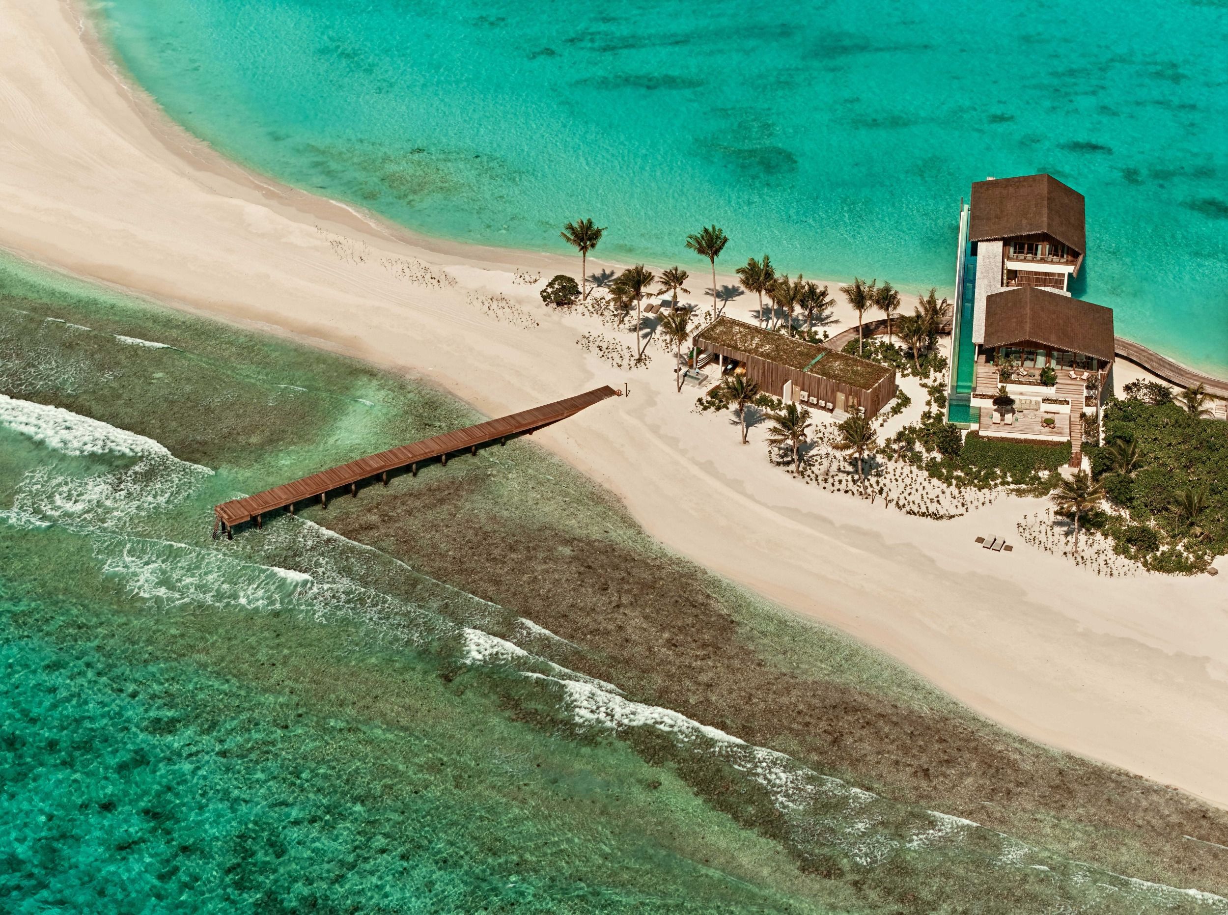 Aerial view of four-bedroom residence with watersports and dive center facilities
