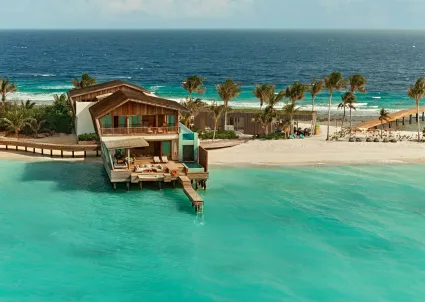 Aerial view of four-bedroom residence with lagoon view
