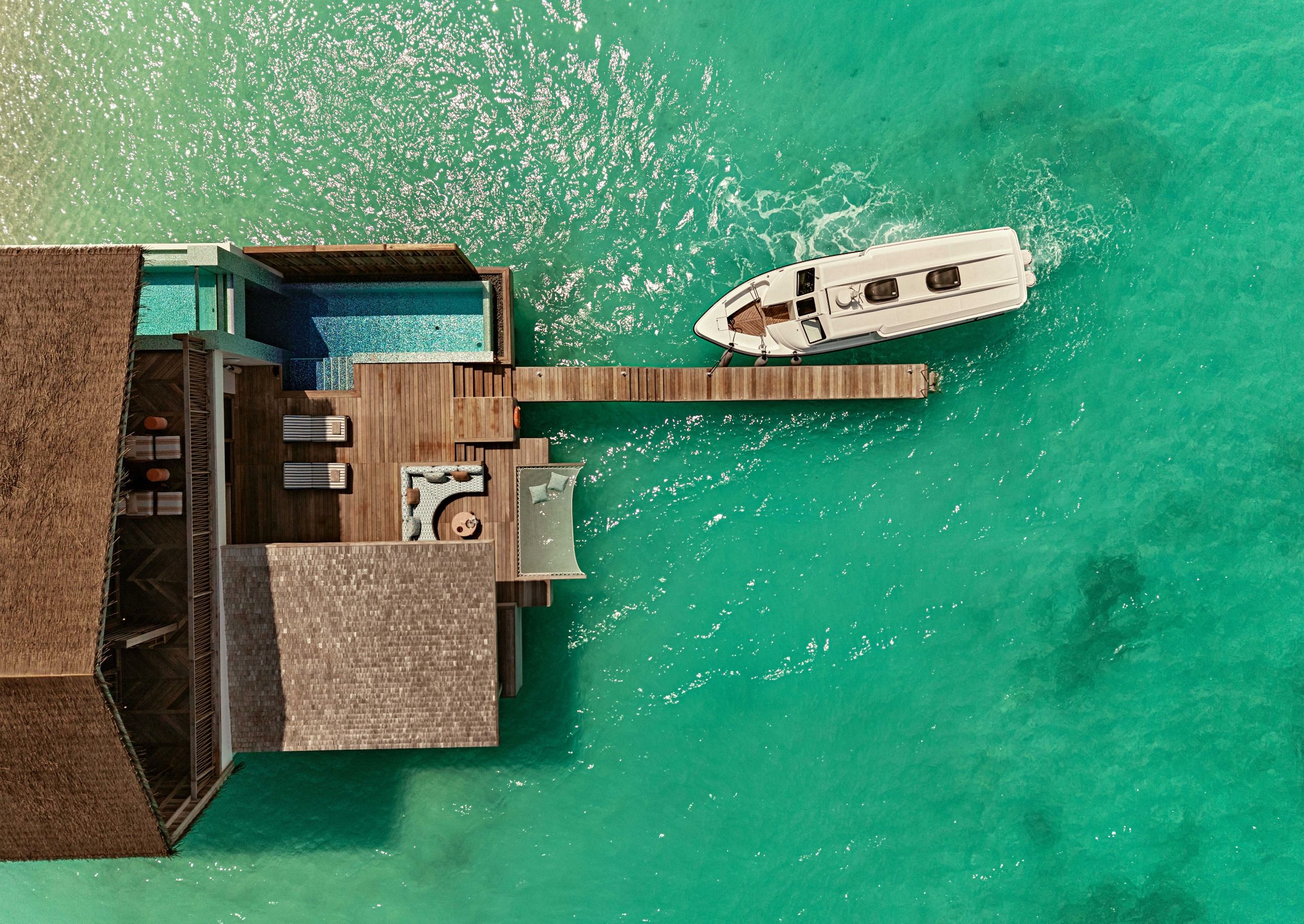 Here Speedboat docking at In Residence private jetty