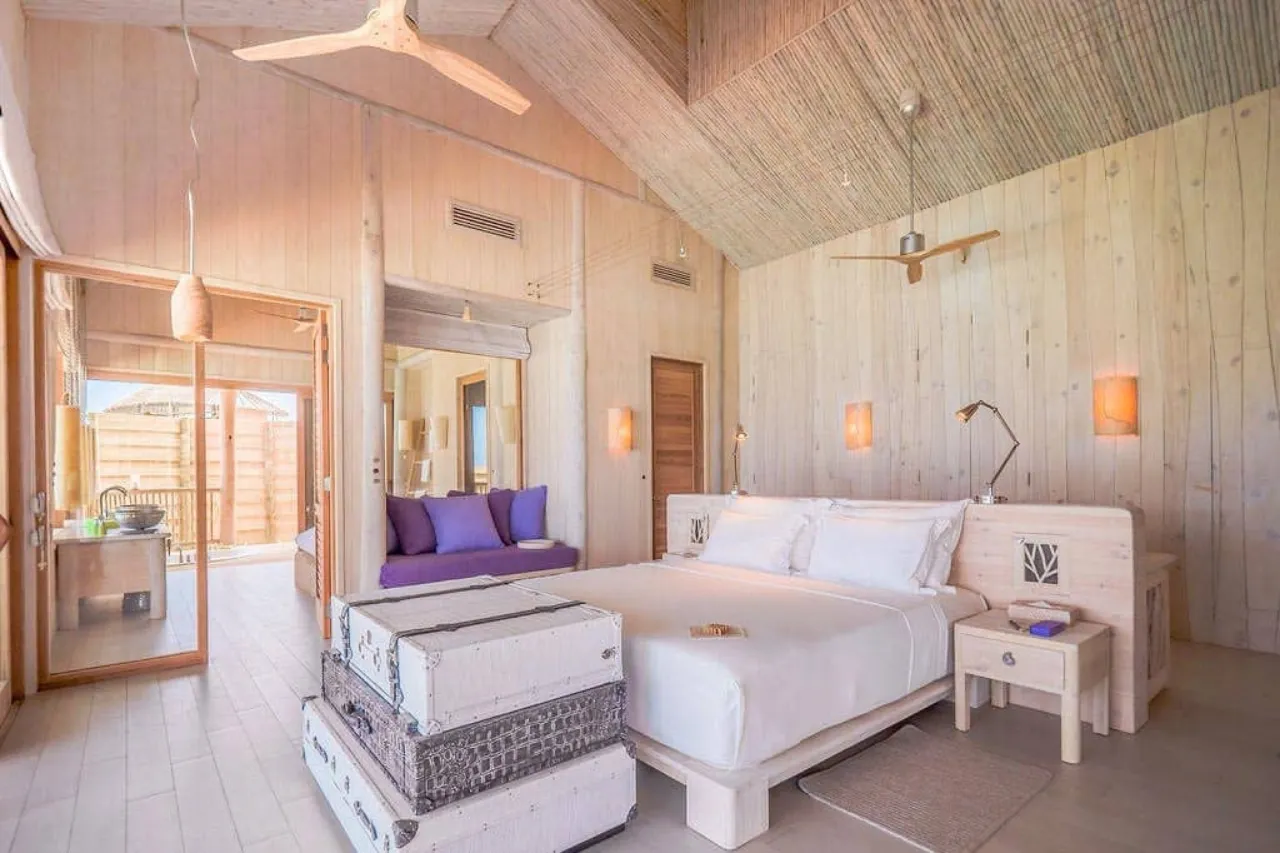 1-bedroom water villa with private slide and bedroom at Soneva Jani