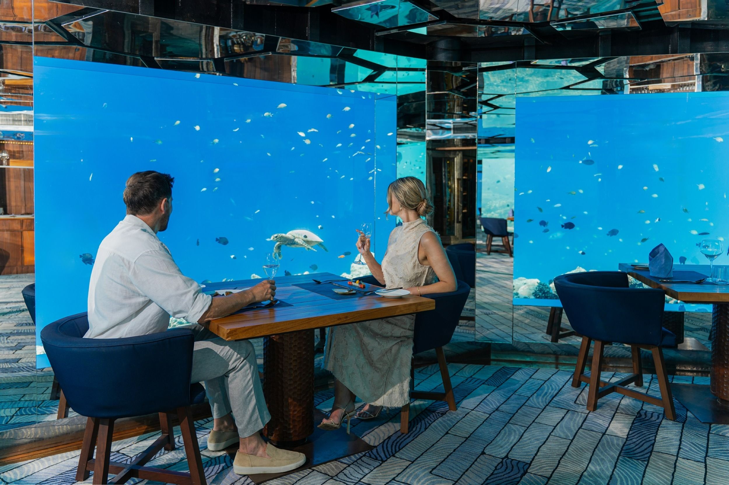 Couple enjoying at SEA underwater restaurant